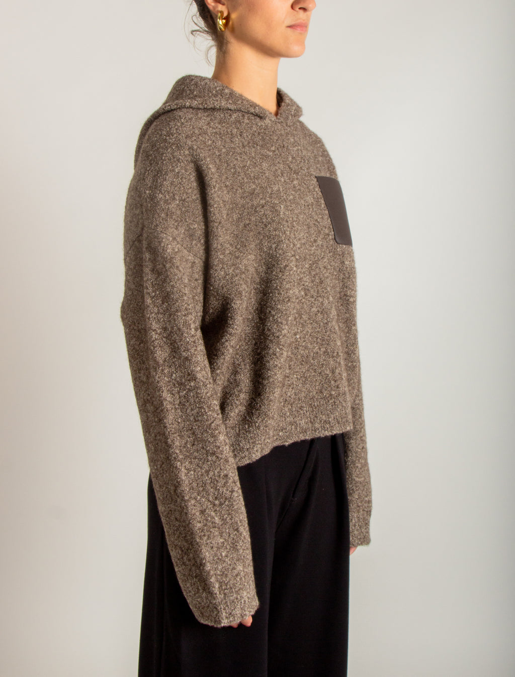 Maglia bouclé con cappuccio