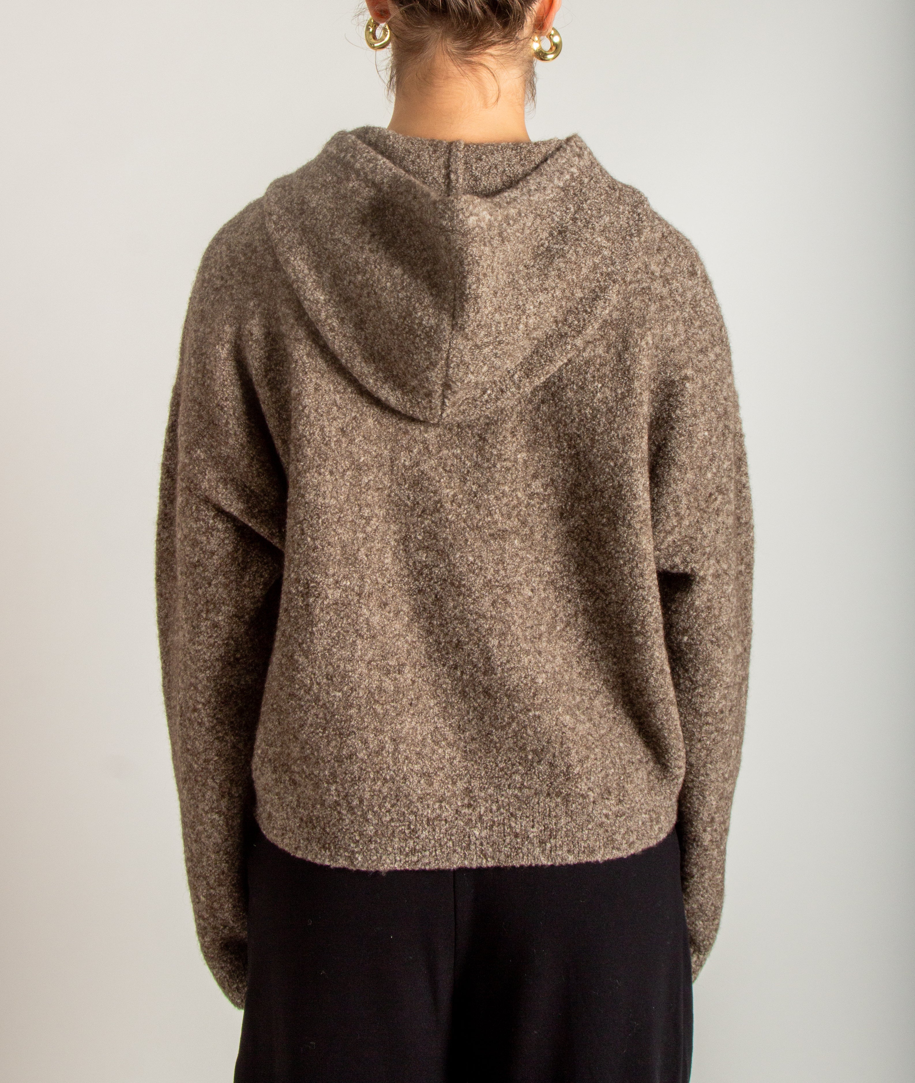 Maglia bouclé con cappuccio
