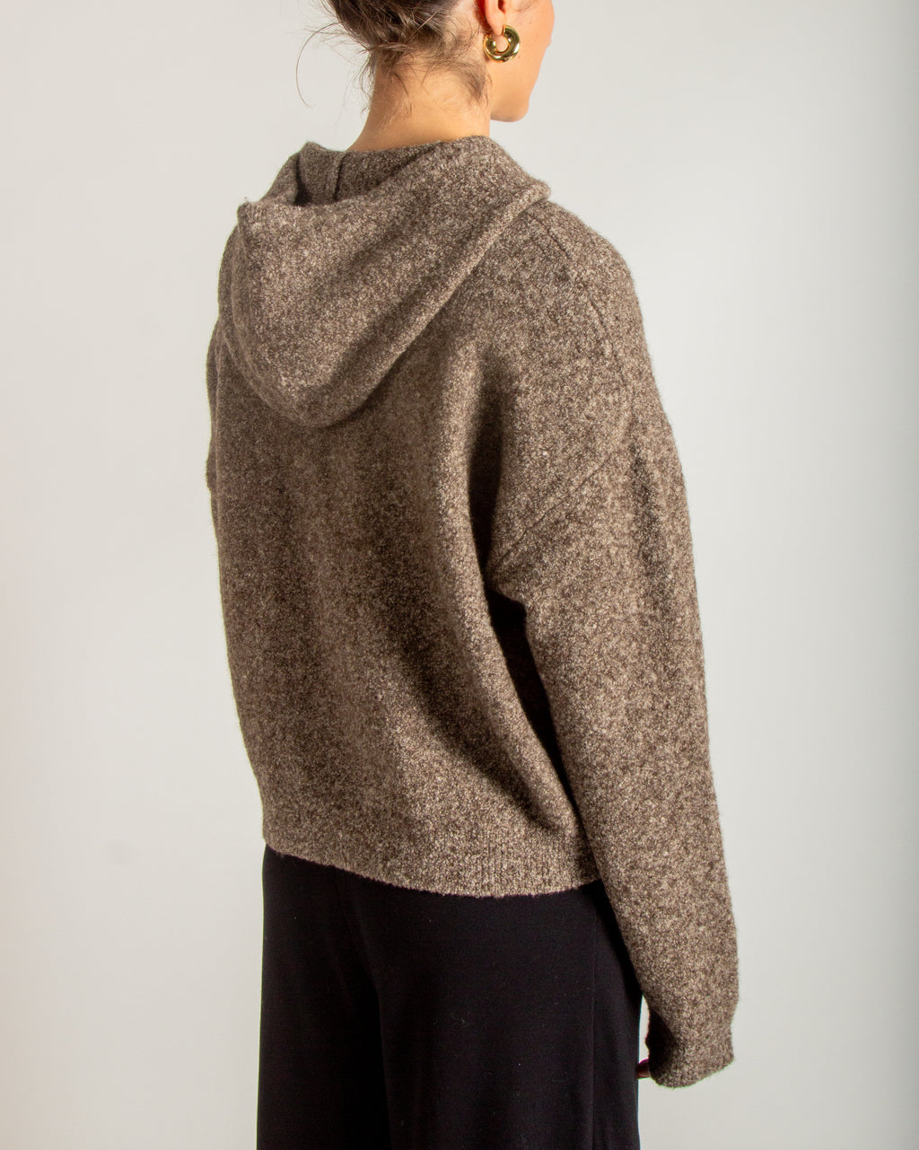 Maglia bouclé con cappuccio