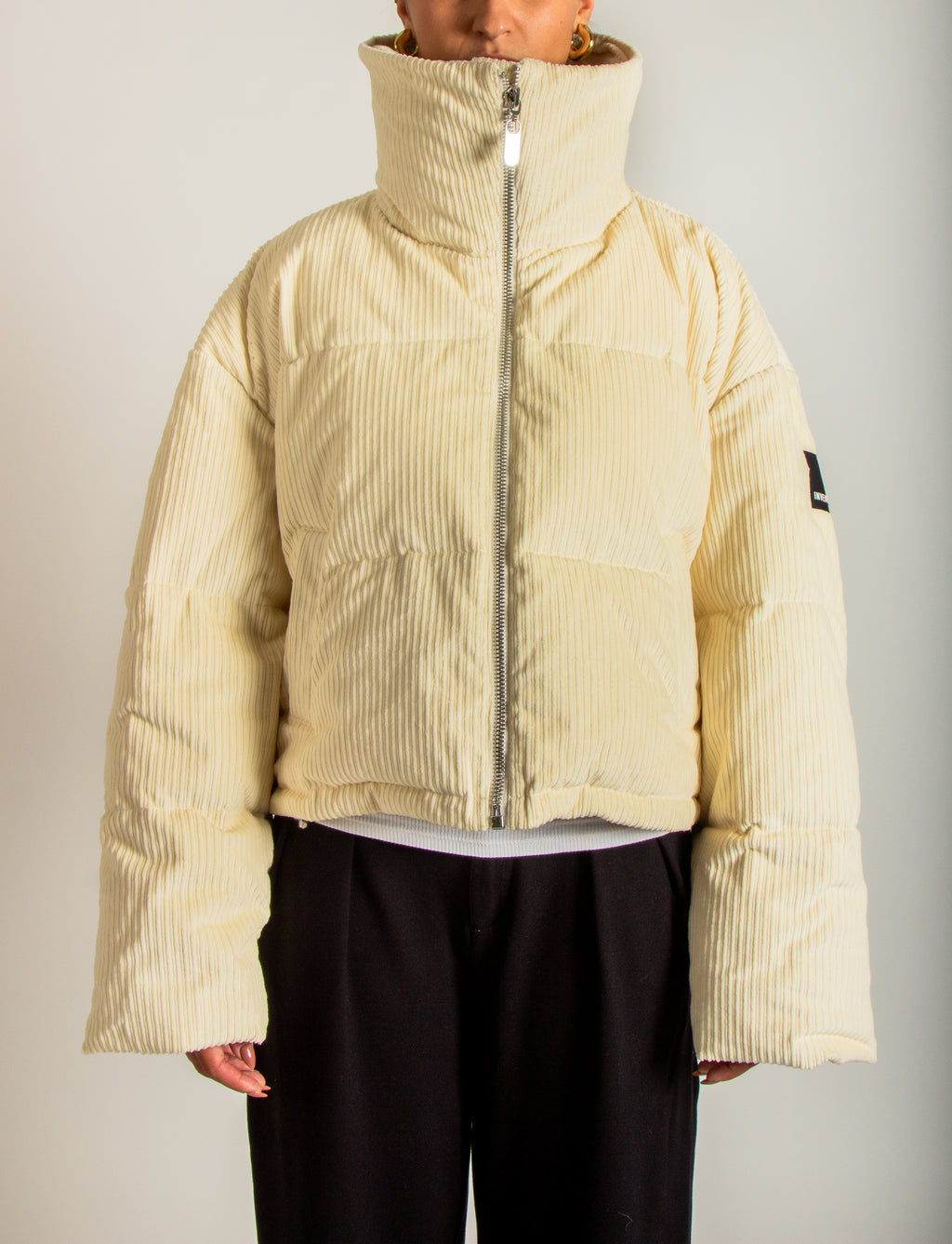 Piumino corto in velluto a coste