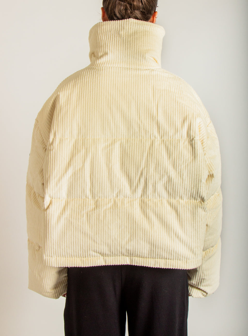 Piumino corto in velluto a coste