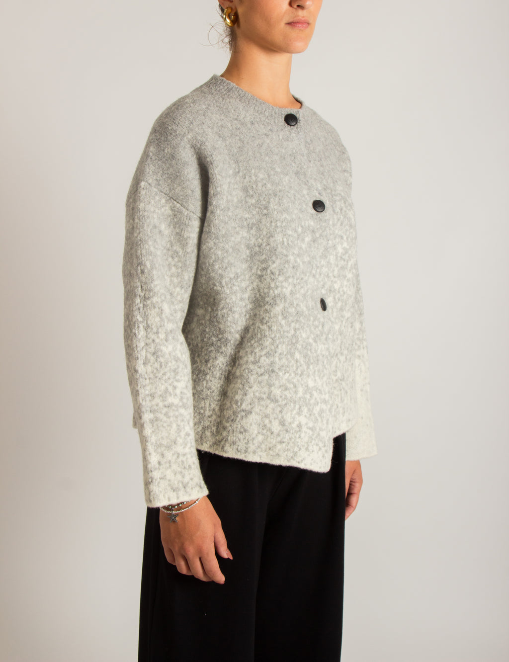 Giacca in maglia chiusura asimmetrica