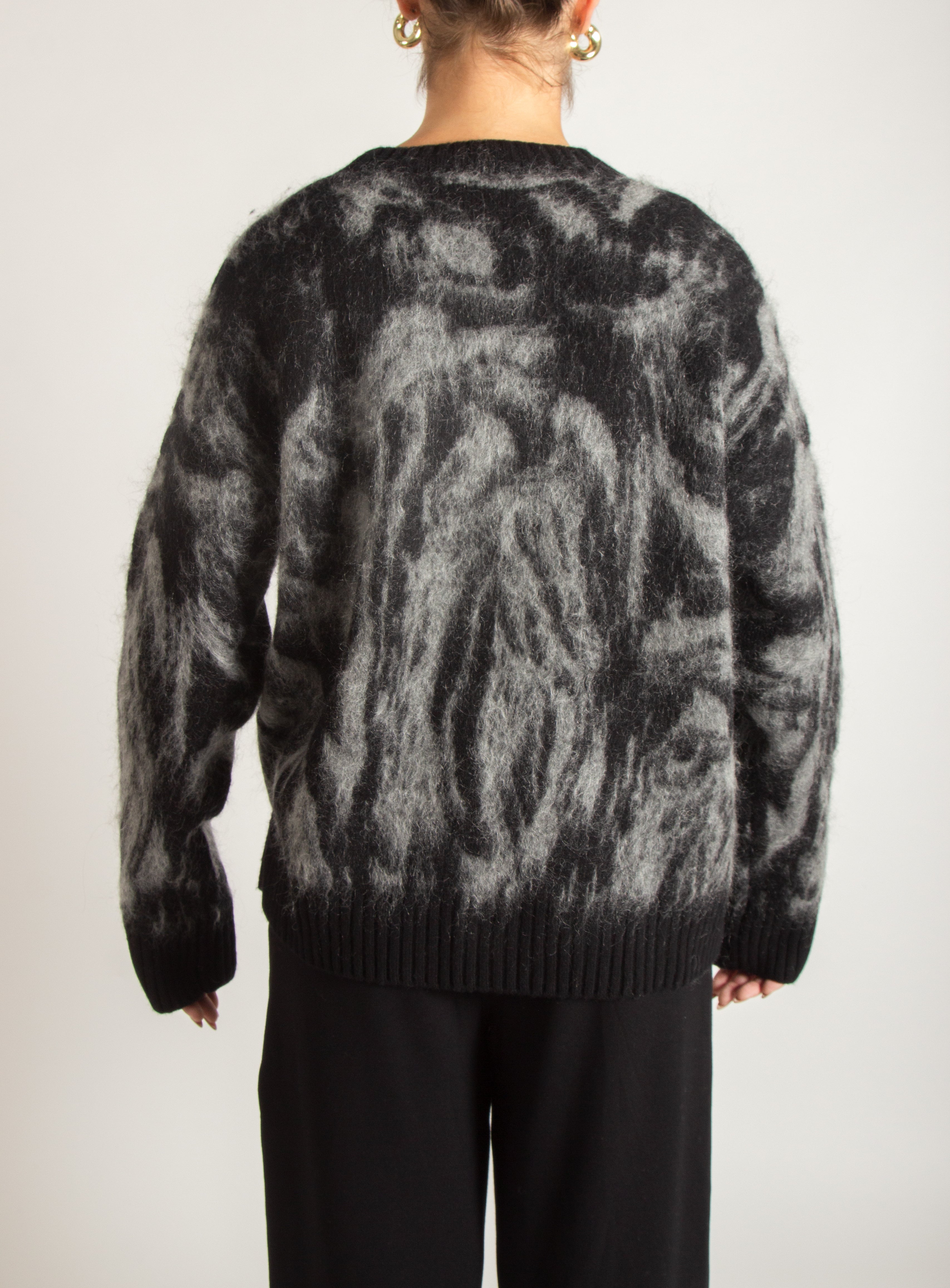 Cardigan tema astratto