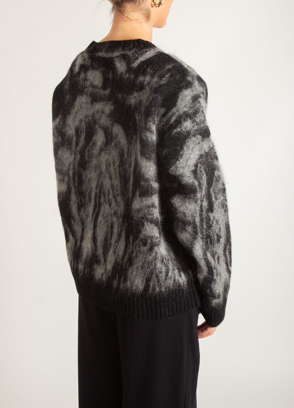 Cardigan tema astratto