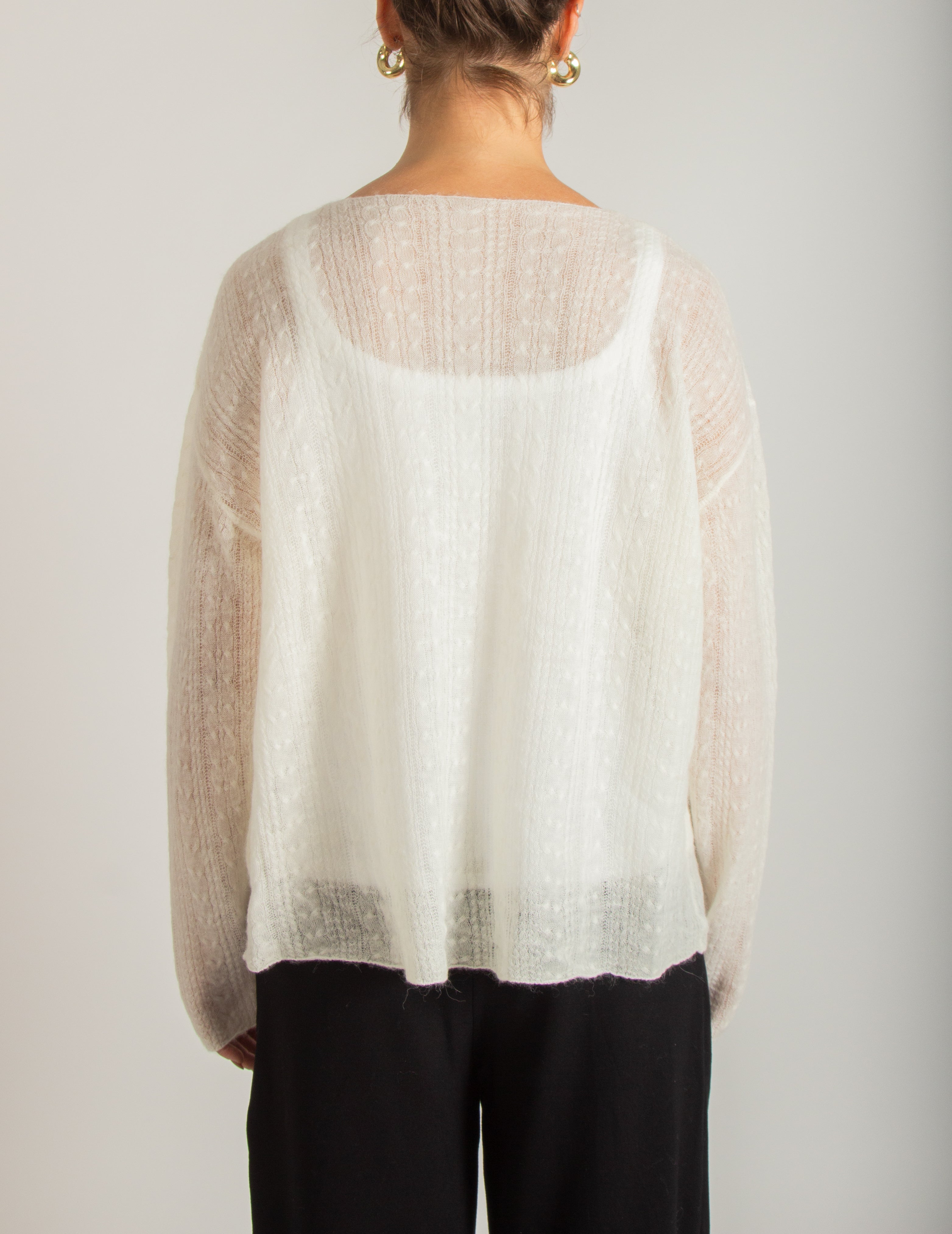 Maglia leggera trasparente traforata a trecce sottili